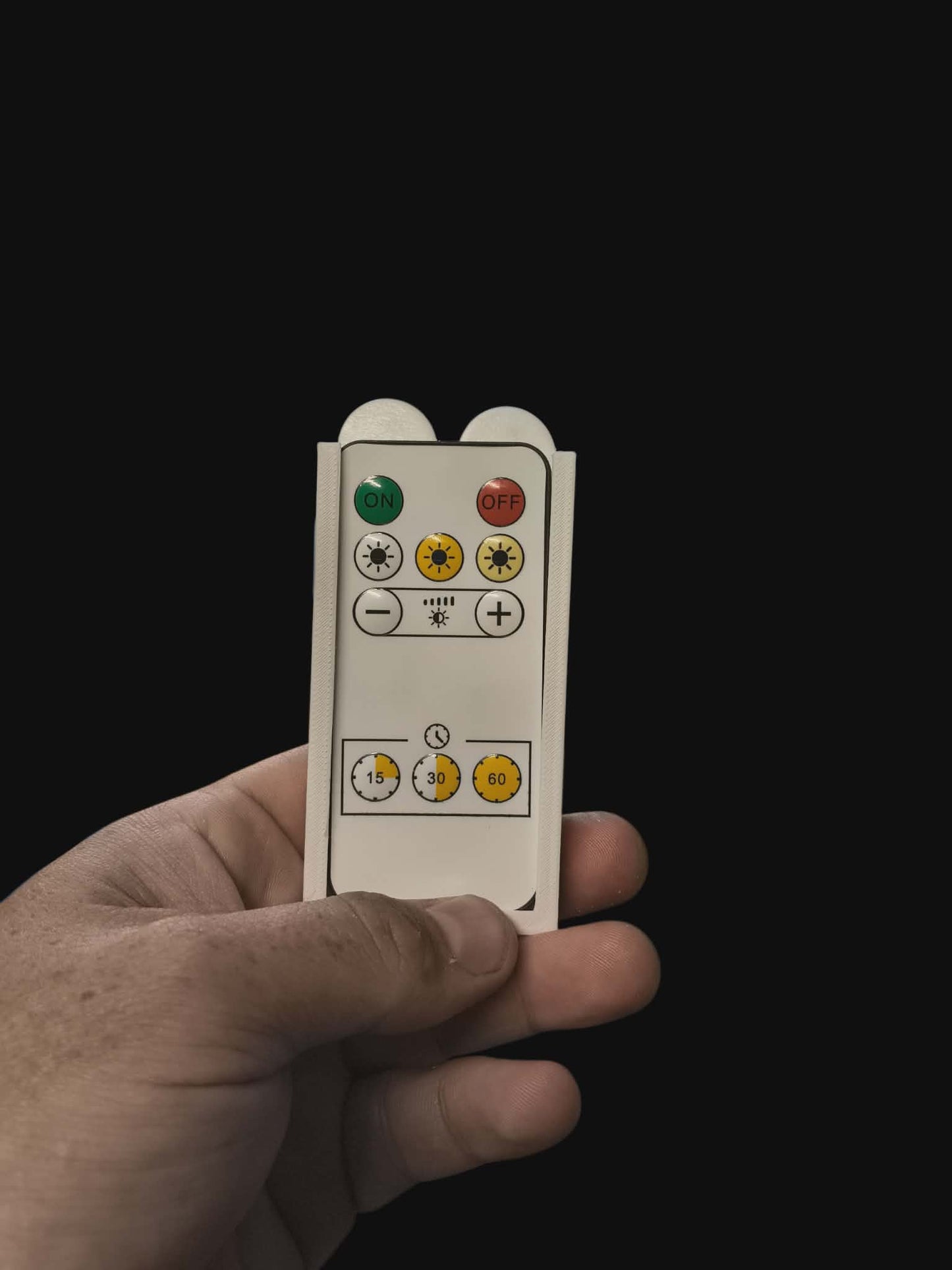 "Wall Mountable Remote Holder"