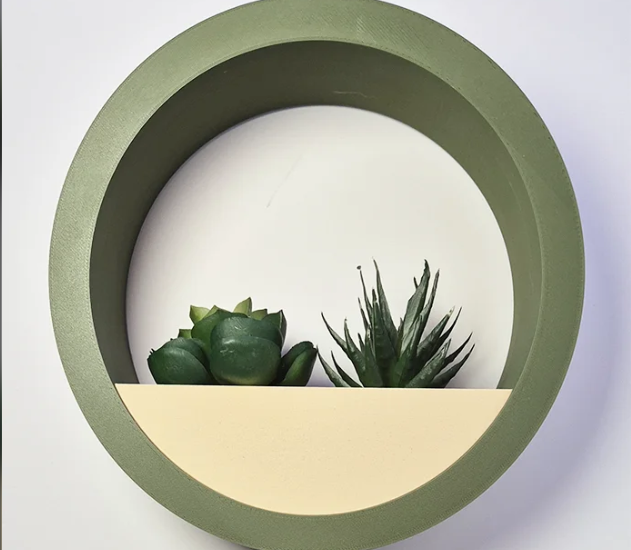 Unique Circle planter with hidden drip tray