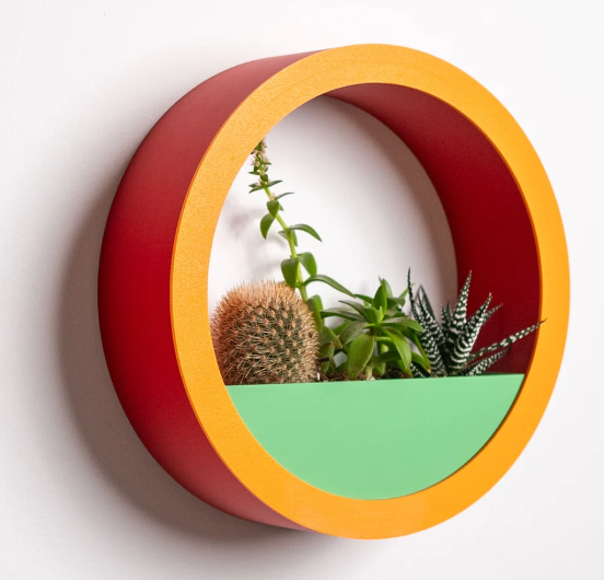 Unique Circle planter with hidden drip tray